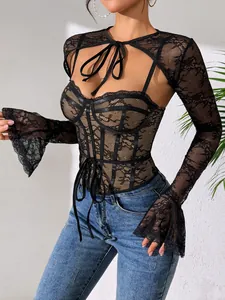 Detailed close-up view of the intricate black floral lace patterns on the sexy mesh shrug set