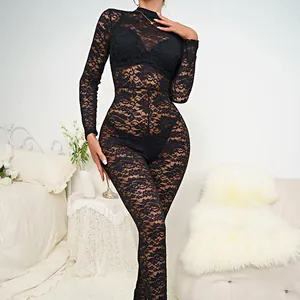 Close-up detail of sexy black floral lace long-sleeve see-through bodysuit showing the fit