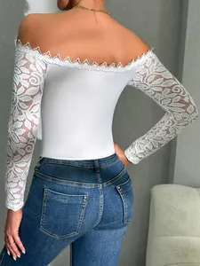 Back view of a white off-the-shoulder lace corset top with long sleeves