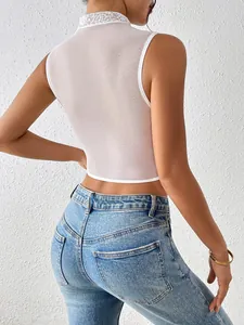 Detailed back view of a white mesh sleeveless crop top featuring a delicate lace collar