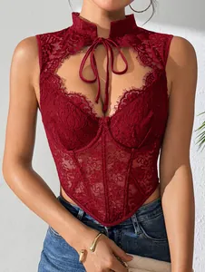 Close-up detail of a burgundy lace corset top with underwire and front tie neck design