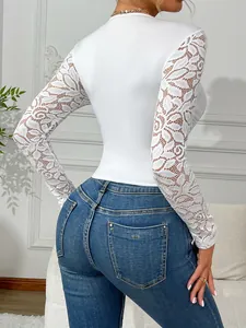 Close-up back view of elegant white corset top with sheer floral lace long sleeves