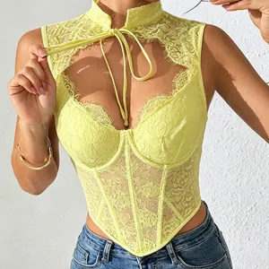 Close-up of a yellow floral lace corset top featuring a sexy cutout and tie-front neck detail.