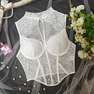 Elegant white lace corset bustier top detail featuring underwire and ribbon ties