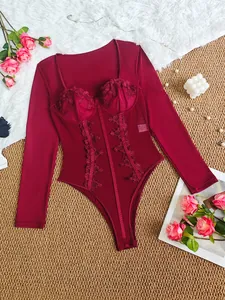 Elegant burgundy long-sleeve bodysuit with lace detailing and mesh panels