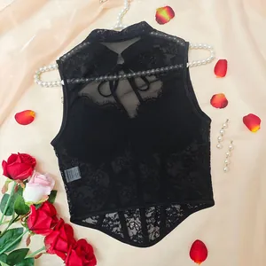 Back view detail of a black lace fishbone corset top with ribbon tie closure