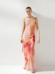 Elegant V-neck camisole maxi dress with vibrant pink and orange abstract print