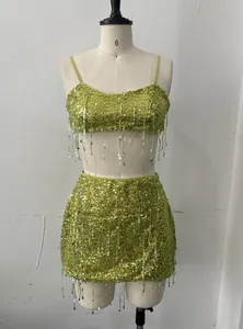 Detail view of lime green sequin fringe two-piece set on a mannequin