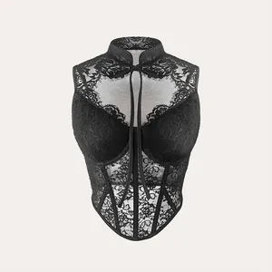 Close-up detail of a black lace corset top featuring underwire cups and mesh panels