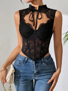 Sultry black lace fishbone corset top with steel ring support and tie-front high neck detail