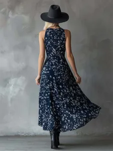 Back view of a sleeveless navy blue floral midi dress with a cinched waist design