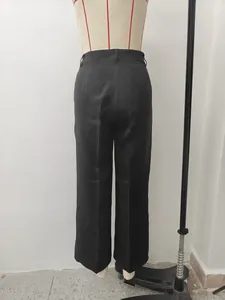 Detailed back view of professional black high waisted straight leg trousers on a mannequin