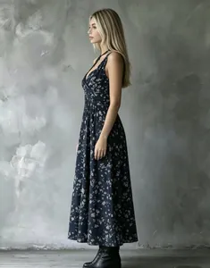 Detailed side view of a stylish navy blue floral V-neck midi dress for vacation