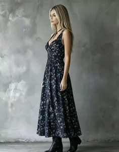Detailed side view of an elegant navy floral V-neck maxi dress for summer vacations