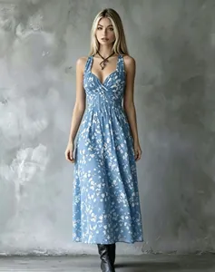 Full-length view of a V-neck floral midi dress showing the cinched waist and flowy fit.