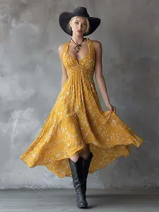 Yellow floral Bohemian halter maxi dress with asymmetrical hem for vacation