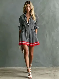 Elegant full length view of the striped mini shirt dress with unique red hem detail