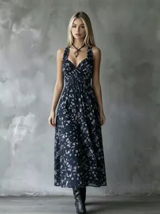 Elegant floral halter V-neck maxi dress with cinched waist for vacation style.