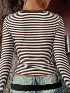 Back detail view of a slim-fit brown and white striped long-sleeved Y2K style T-shirt