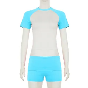 Set sportivo due pezzi da donna con maniche raglan e colori a contrasto blu e beige