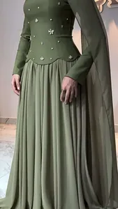 Elegant olive green long-sleeved evening gown with intricate pearl bodice embellishments