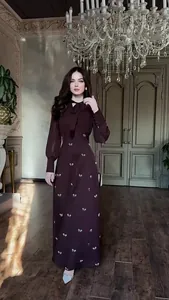 Elegant French retro long sleeve maxi dress with a bow tie neck and white floral pattern