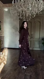 Full view of elegant French vintage dark dress with bow patterns in luxury room