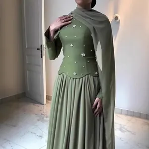 Elegant green slim-fit long sleeve maxi dress with floral beadwork and matching scarf