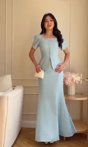 Elegant light blue short-sleeved peplum top and long mermaid skirt set for women