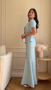 Elegant light blue two-piece set featuring short-sleeved top and maxi skirt for women
