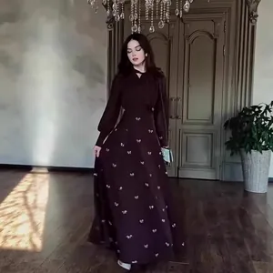 Elegant French retro long sleeve maxi dress featuring delicate embroidered bow motifs