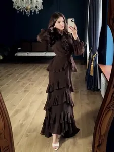 Elegant long-sleeved tiered ruffle maxi dress with waist-slimming fit in dark brown