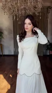 Elegant white maxi dress with long sleeves and detailed vintage square neckline