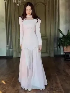 Elegant palace style vintage long-sleeved maxi dress for women in soft blush pink