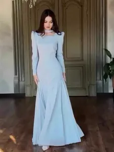 Elegant light blue vintage palace style long-sleeved maxi dress for women.