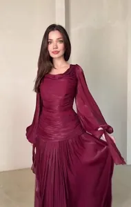 Detailed view showing the elegant pleated texture of the burgundy long sleeve dress.