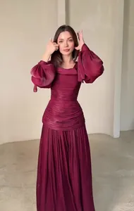 Elegant burgundy pleated maxi dress with lantern sleeves and ruched waist detail