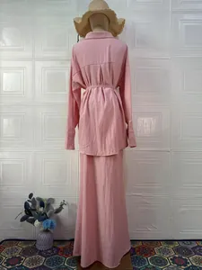 Elegant pink loose long sleeve shirt and maxi skirt two-piece set, back view detail