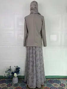 Back view of modest three-piece floral set with blazer, long skirt and matching hijab