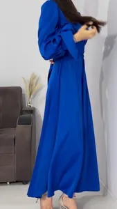 Detail view of royal blue satin maxi dress with bubble sleeves and cinched waist