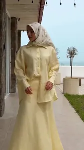 Elegant modest pale yellow long sleeve shirt and flowy maxi skirt set for women
