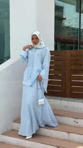 Elegant two-piece modest set with light blue long sleeve shirt and maxi skirt