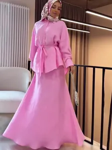 Elegant pink long-sleeved modest blouse and maxi skirt set for women