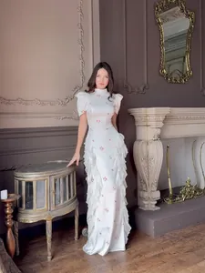 Elegant floral print maxi dress for spring with chic ruffles and short puff sleeves for women