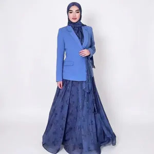 Elegant modest women's suit set featuring a light blue blazer and long navy patterned skirt