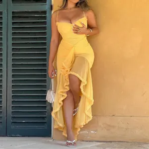 Elegant yellow ruffled spaghetti strap sleeveless maxi dress with mesh ruffles and high slit.