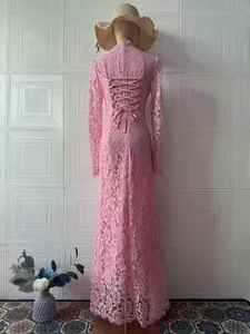 Detailed back view of a pink Victorian-style lace maxi dress featuring corset lace-up design