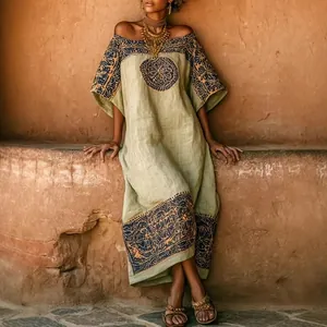 Detail of Bohemian sage green midi dress with intricate ethnic circular prints for vacation