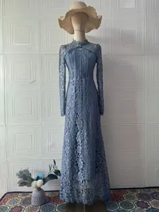 Elegant light blue lace long sleeve maxi dress in Victorian style shown on mannequin