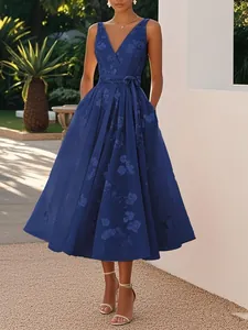 Sleeveless V-neck evening dress in royal blue with elegant floral digital print detail